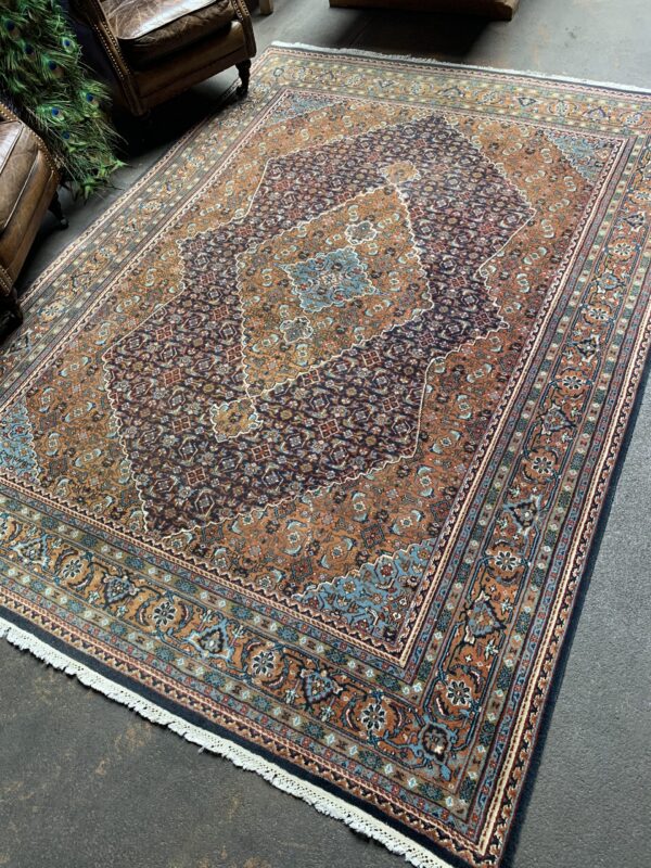 Hand-knotted vintage woolen Bidjar Persian carpet.