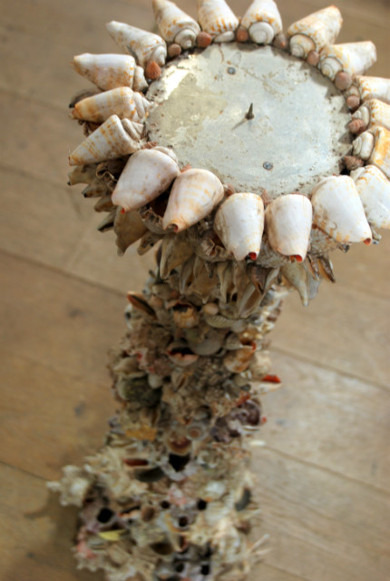 Candlestick made of shells.