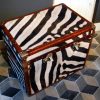 Large handmade suitcase lined with zebra skin