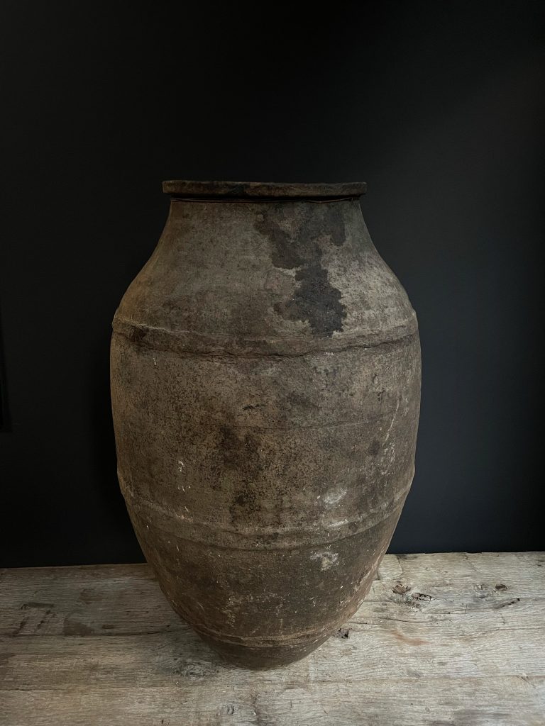 Decorative antique terracotta jug